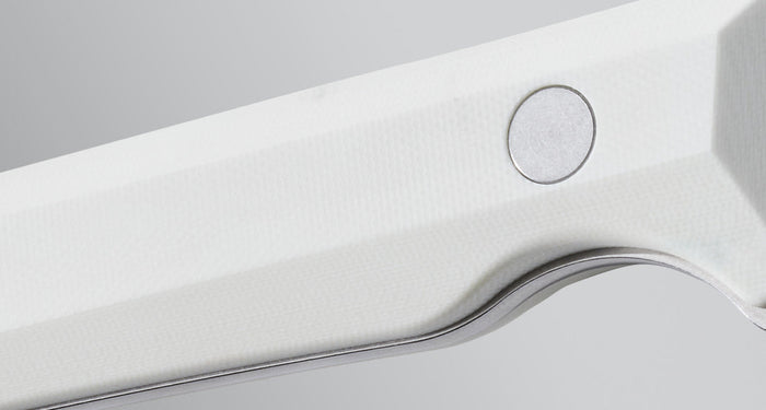Translation missing: en.Close-up view of the white textured handle of a Leatherman knife, showcasing the clean lines, contoured grip, and precision-fastened hardware against a neutral background