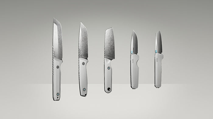 Translation missing: en.Product display image featuring five Leatherman knives in a clean, gradient-lit studio setting. The lineup includes various blade styles and handle orientations, all in a matching alpine white colorway, showcasing both profile and edge-on views to highlight the craftsmanship and design variations